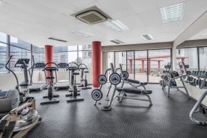 Fully equipped gym with cardio machines, free weights and strength training equipment at the ICON building in Cape Town CBD.